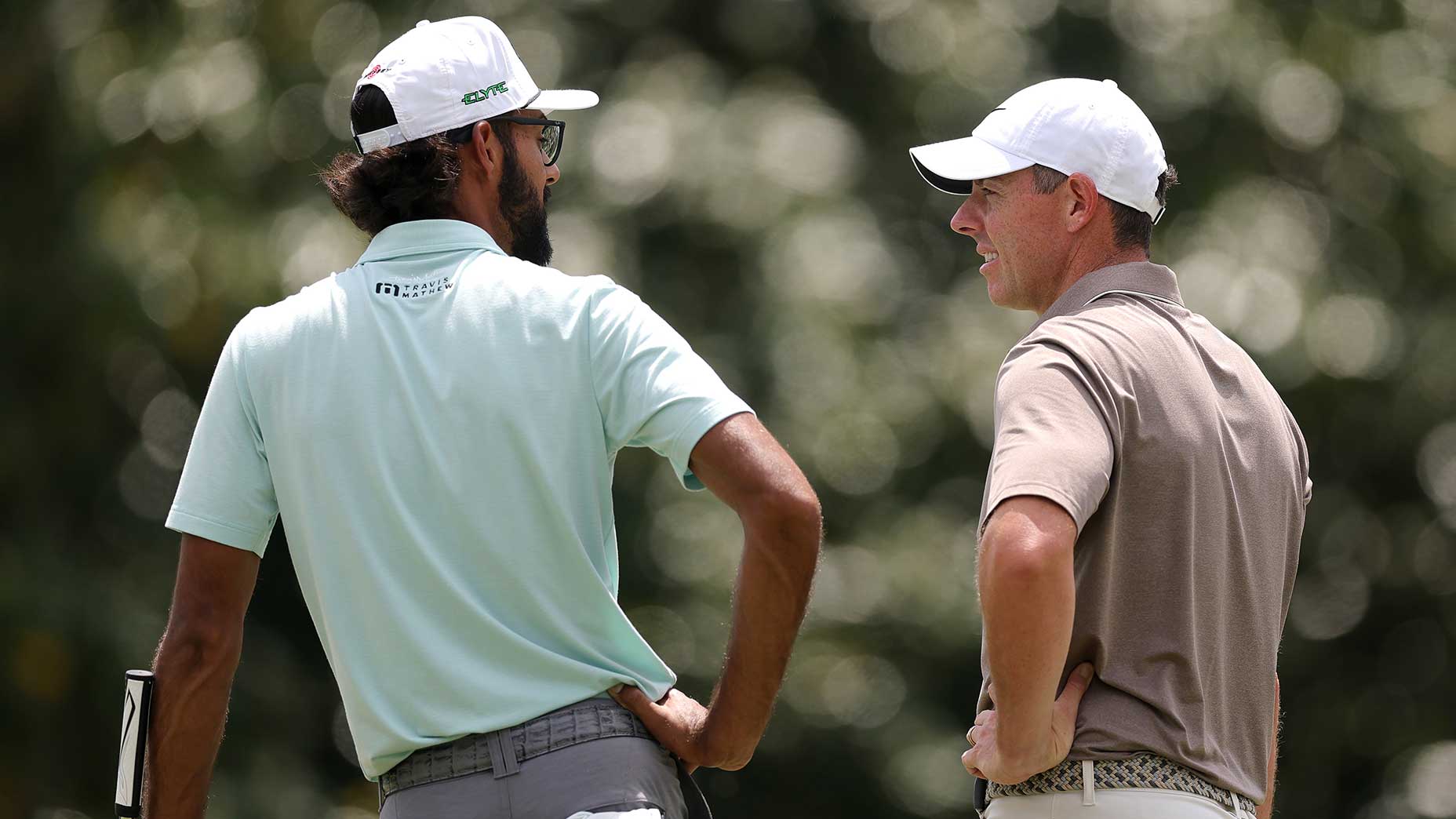 Akshay Bhatia and Rory McIlroy at the 2025 Masters.