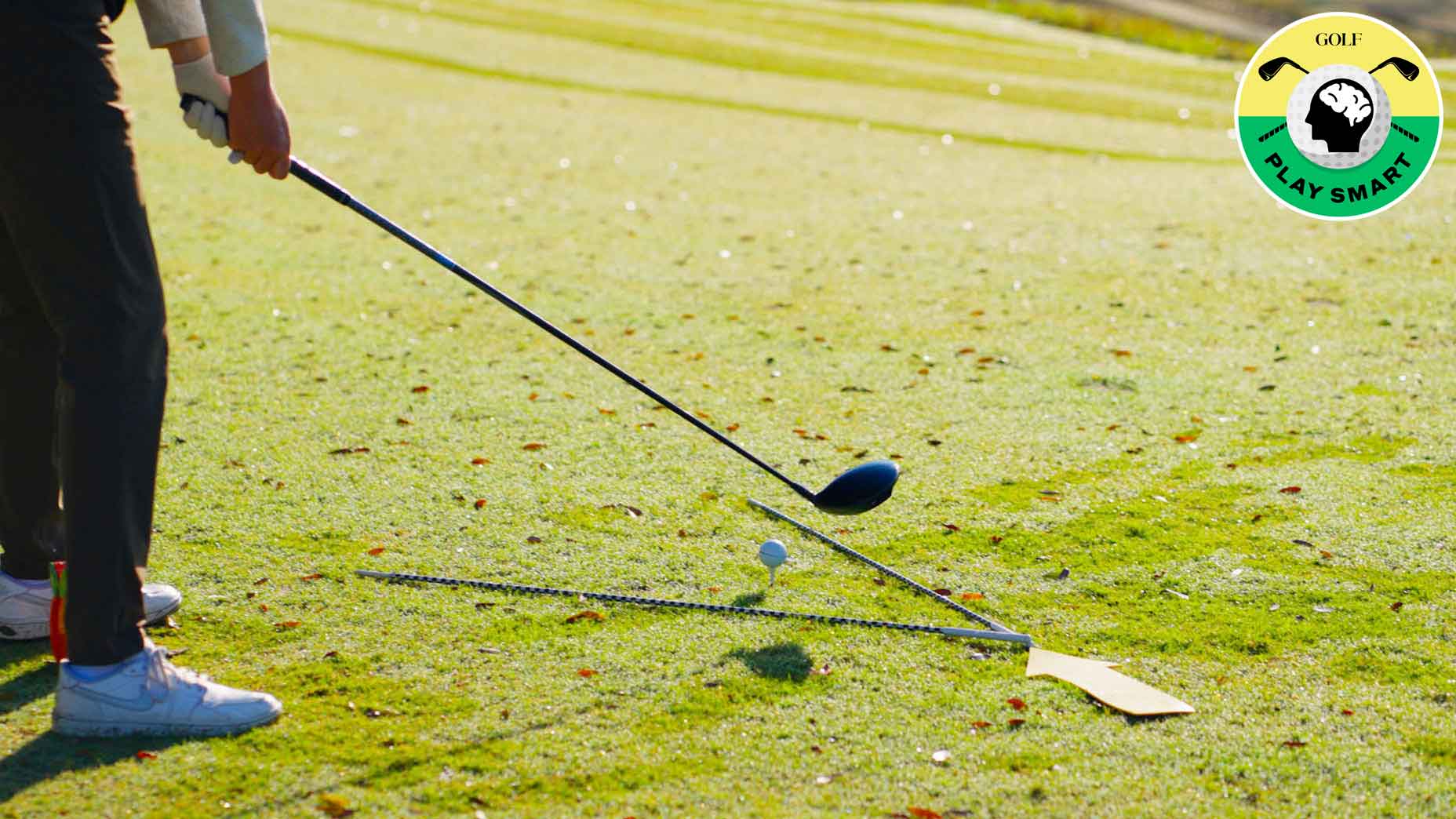 ball teed it with driver hovering above it