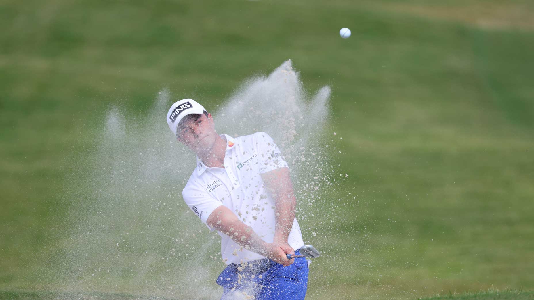 Viktor Hovland hits a high bunker shot