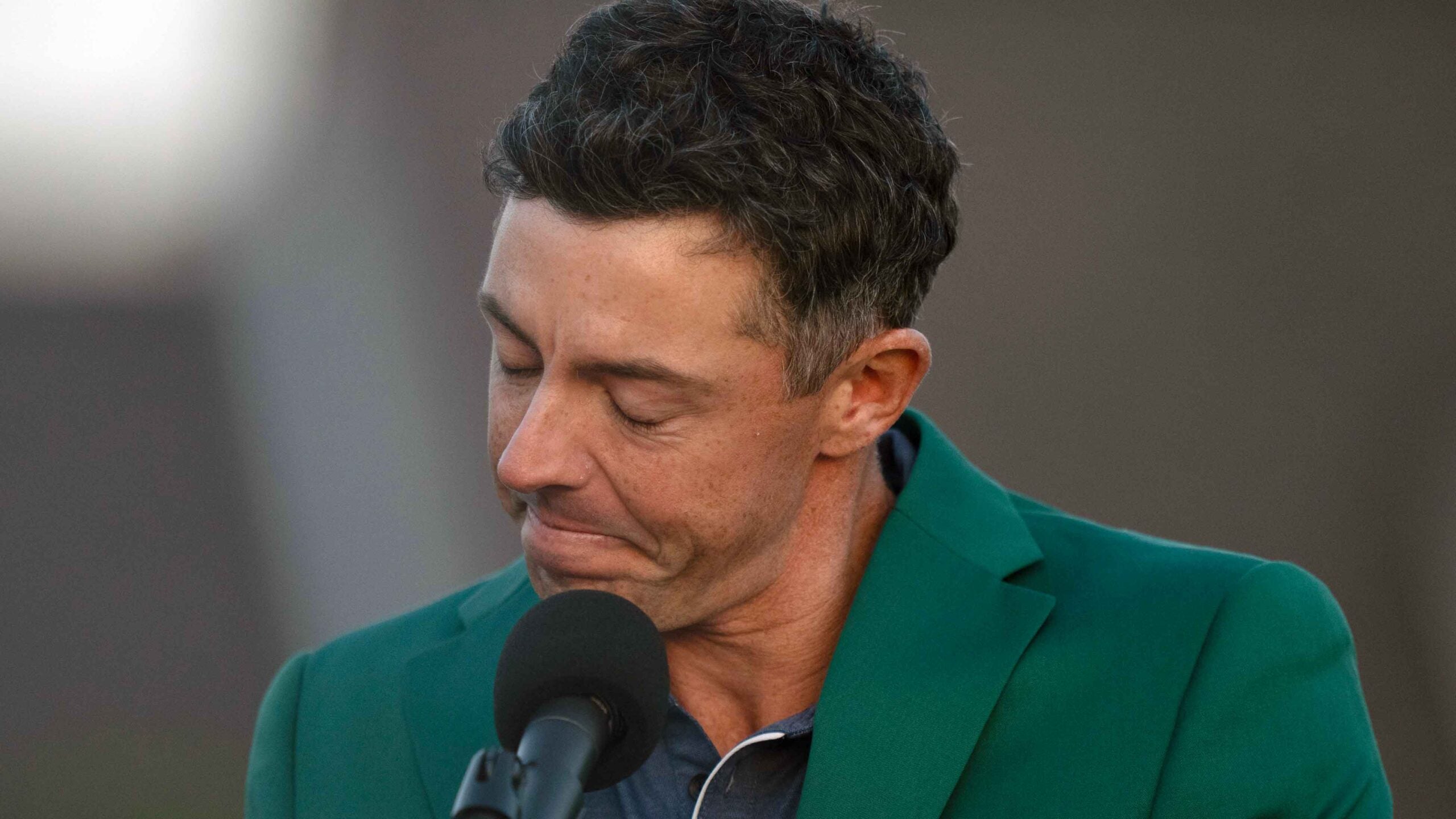 Rory McIlroy victorious during green jacket ceremony after winning sudden death playoff round to win the tournament on Sunday at Augusta National.