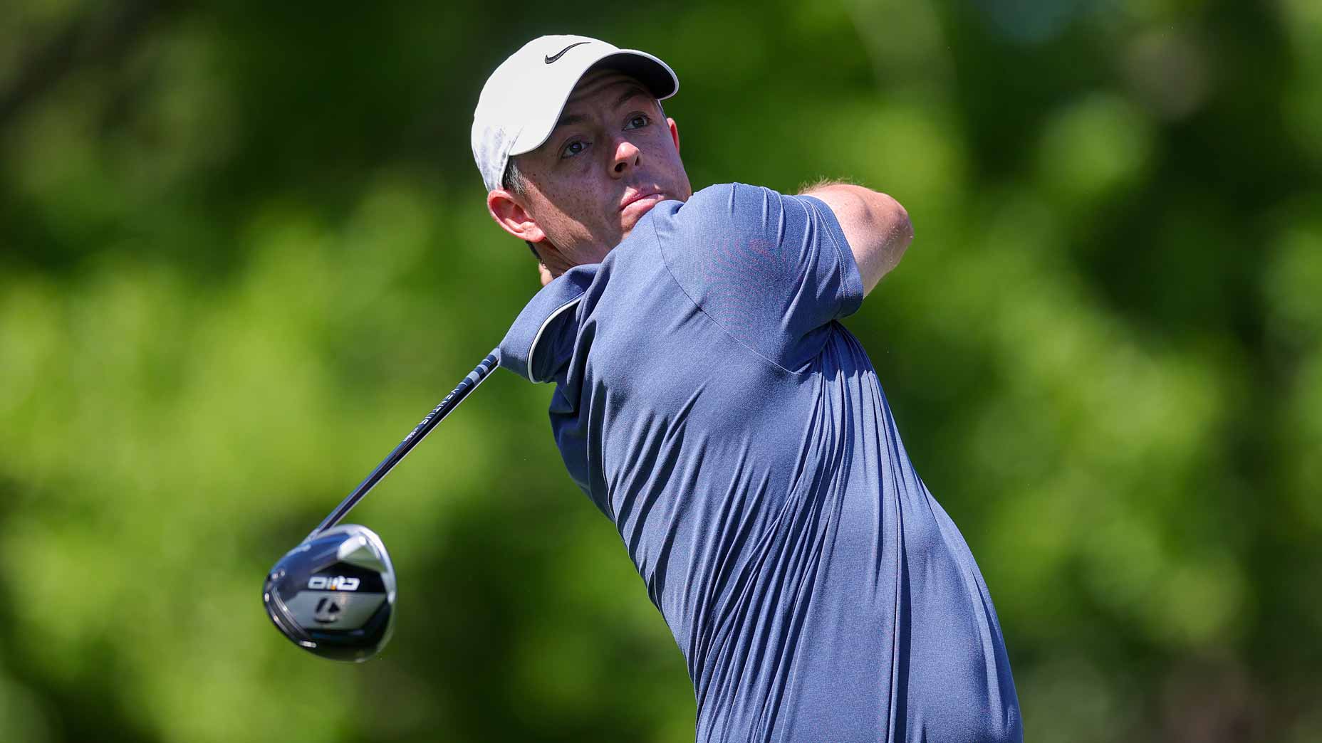 Rory McIlroy hits a driver at Augusta National.